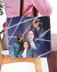Personalized '1980s Lazer Portrait' tote bag featuring a human and two dogs in denim jackets.