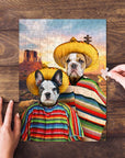 Personalized 2-pet puzzle featuring two dogs in sombreros and ponchos against a desert landscape.