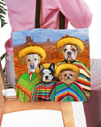 Personalized 4-pet tote bag with dogs in sombreros and ponchos against a desert landscape.