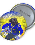 Custom pet portrait pin featuring a black dog in a blue football uniform, named Chip, with a yellow background.