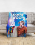 Personalized "Dr. Woof" pet blanket with two dogs in Doctor Who-style costumes on a gray couch.