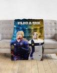 Personalized pet blanket with two dogs in soccer uniforms, "Vilho & Erik" text.