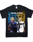 Black Gildan t-shirt featuring two dogs in soccer jerseys, "VILHO & ERIK" text, and a stadium background.