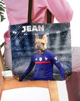 Personalized tote bag with a French Bulldog pet portrait in a blue soccer uniform.