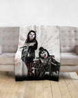 Personalized 'Kiss Doggos' blanket featuring two pets as rock stars on a gray couch.