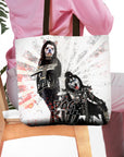 Personalized 'Kiss Doggos' tote bag with two custom pet portraits in rockstar costumes.