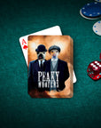 Custom personalized playing cards featuring two dogs in "Peaky Woofers" style outfits on a green felt table with poker chips and dice.