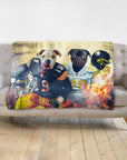 Personalized blanket with two dogs as football players, a white pitbull and a black pug, on a gray couch.