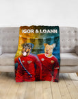 Personalized pet blanket with two dogs in Russian soccer uniforms, "Igor & Loann" text.