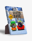 Personalized 'South Bark' standing canvas featuring two dogs in winter gear against a snowy mountain backdrop.