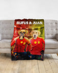 Personalized pet blanket with two dogs in Spain soccer jerseys, "Rufus & Juan" text.