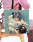 Personalized tote bag featuring a black pug pet portrait as an astronaut on a light blue background.