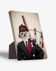 Personalized Shih Tzu pet portrait on a standing canvas, dressed as a bagpiper in a black suit with a red tartan tie and hat.
