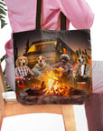 Personalized black tote bag with four pet portraits camping around a bonfire.
