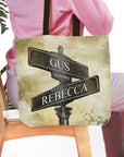 Personalized tote bag with custom street signs for Gus and Rebecca, 11-11-2021, on a watercolor background.