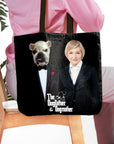Black personalized tote bag with custom "Dogfather & Dogmother" pet and human portraits.