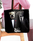 Personalized black tote bag with two custom dog portraits dressed in "The Dogfathers" style suits.