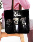 Personalized black tote bag with three custom dog portraits dressed in "Dogfathers" suits.