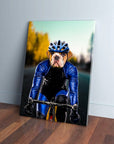 Personalized pet canvas featuring a bulldog in a blue cycling helmet and suit on a bike.