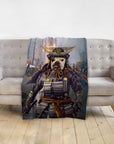 Personalized pet blanket with a French Bulldog in a samurai warrior portrait design, draped over a gray sofa.