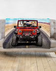Personalized 3-pet blanket with a custom cartoon portrait of dogs in a red Jeep on a desert road.