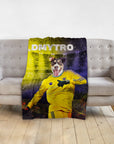 Personalized pet blanket with a dog's head on a Ukrainian football player's body, yellow and blue background.