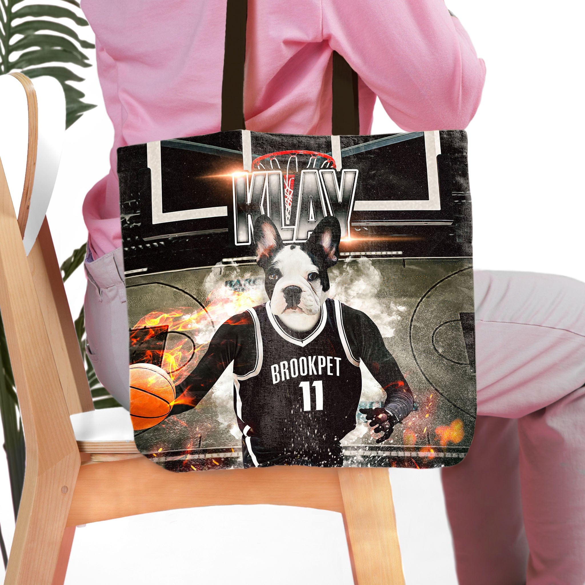 Personalized black tote bag with a custom French Bulldog pet portrait in a basketball jersey.