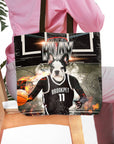 Personalized black tote bag with a custom French Bulldog pet portrait in a basketball jersey.