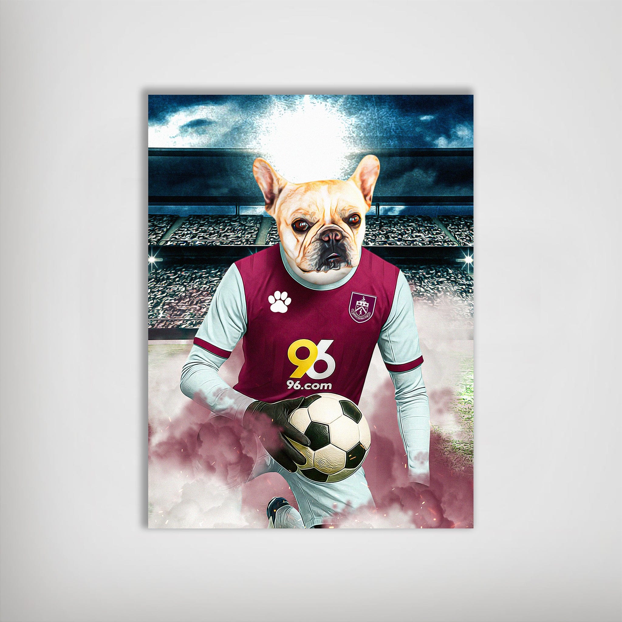 Personalized matte poster featuring a French Bulldog in a claret and blue Burnley football kit, holding a soccer ball on a field.