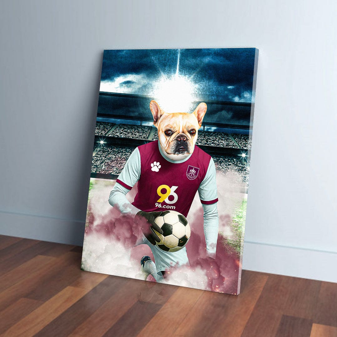 Personalized pet canvas featuring a French Bulldog in a Burnley football kit, dribbling a soccer ball on a stadium field.