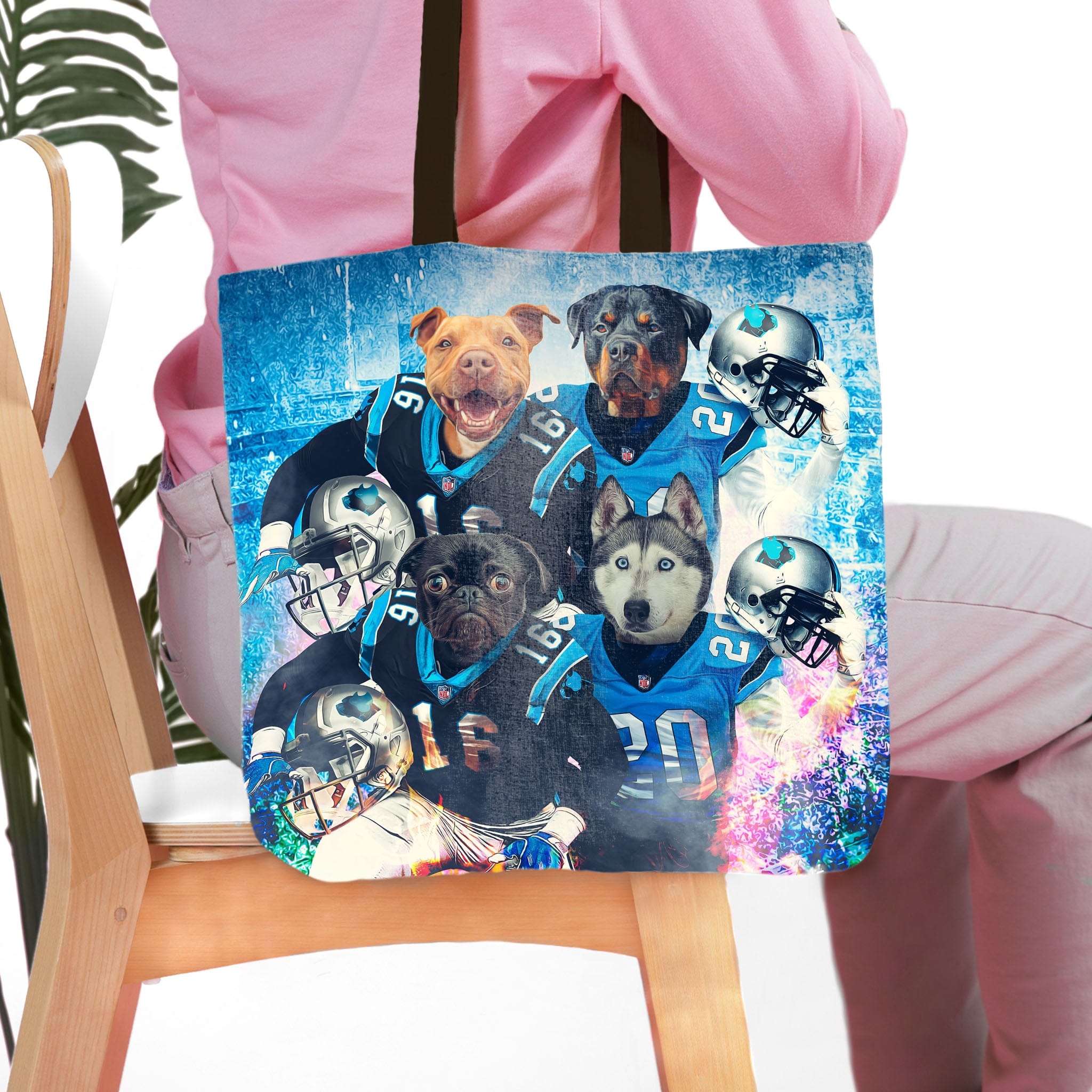 Personalized Carolina Doggos 4-pet tote bag with custom dog portraits in football jerseys.