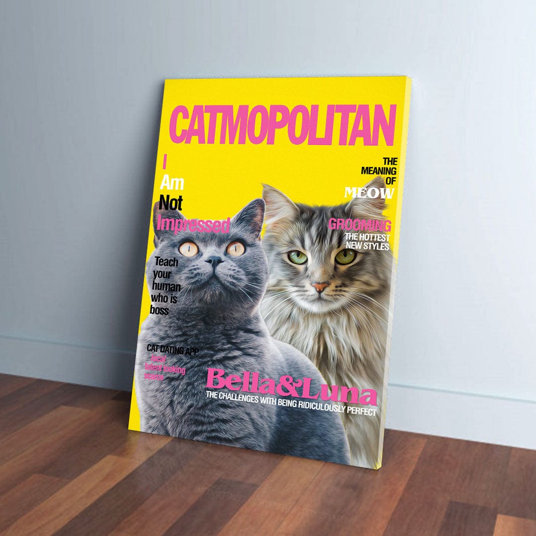 Yellow "Catmopolitan" canvas with two cats, a grey and a tabby, on a wooden floor.