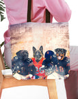 Personalized 3-pet tote bag with custom dog portraits in football jerseys.