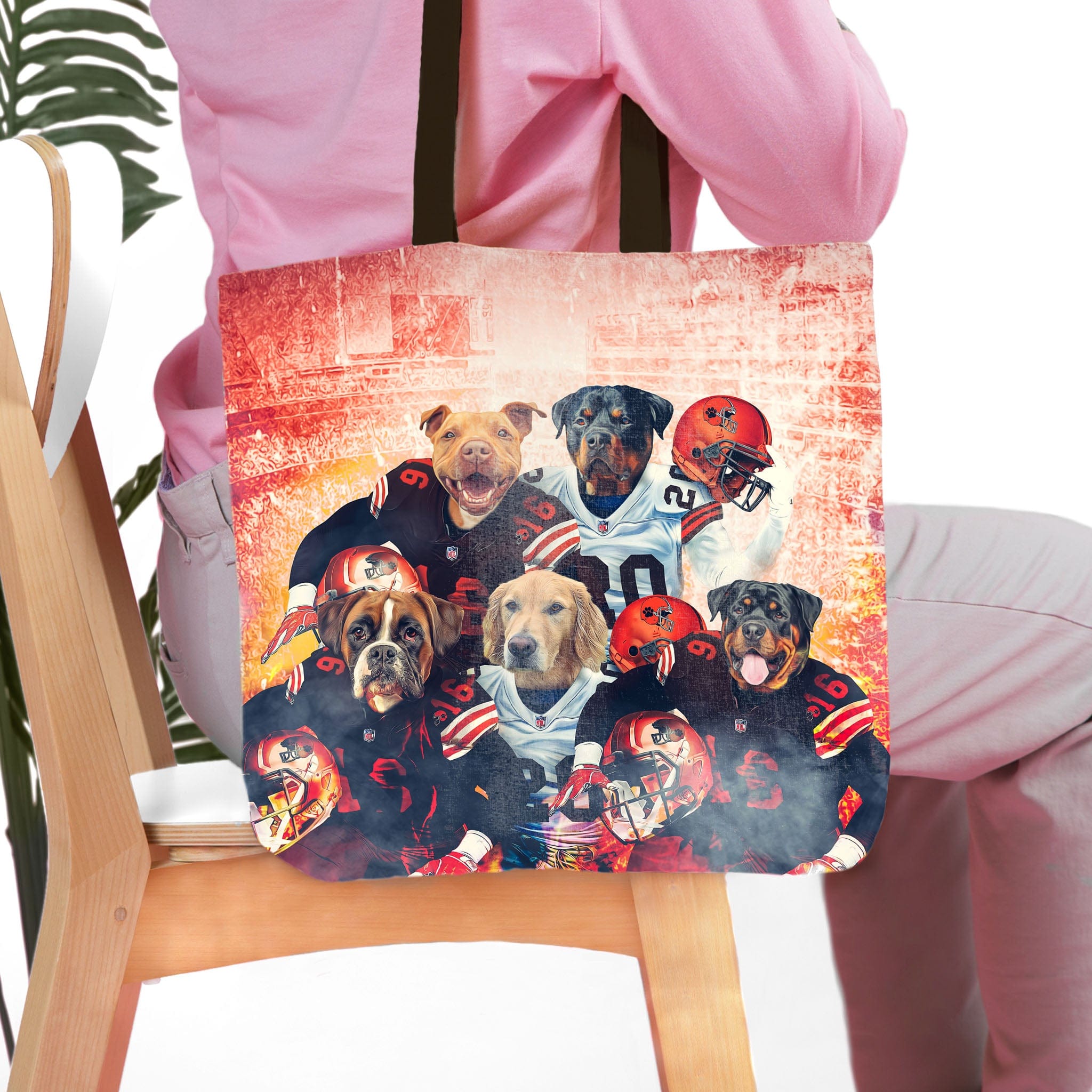 Personalized 'Cleveland Doggos' 5-pet tote bag featuring dogs in football uniforms.