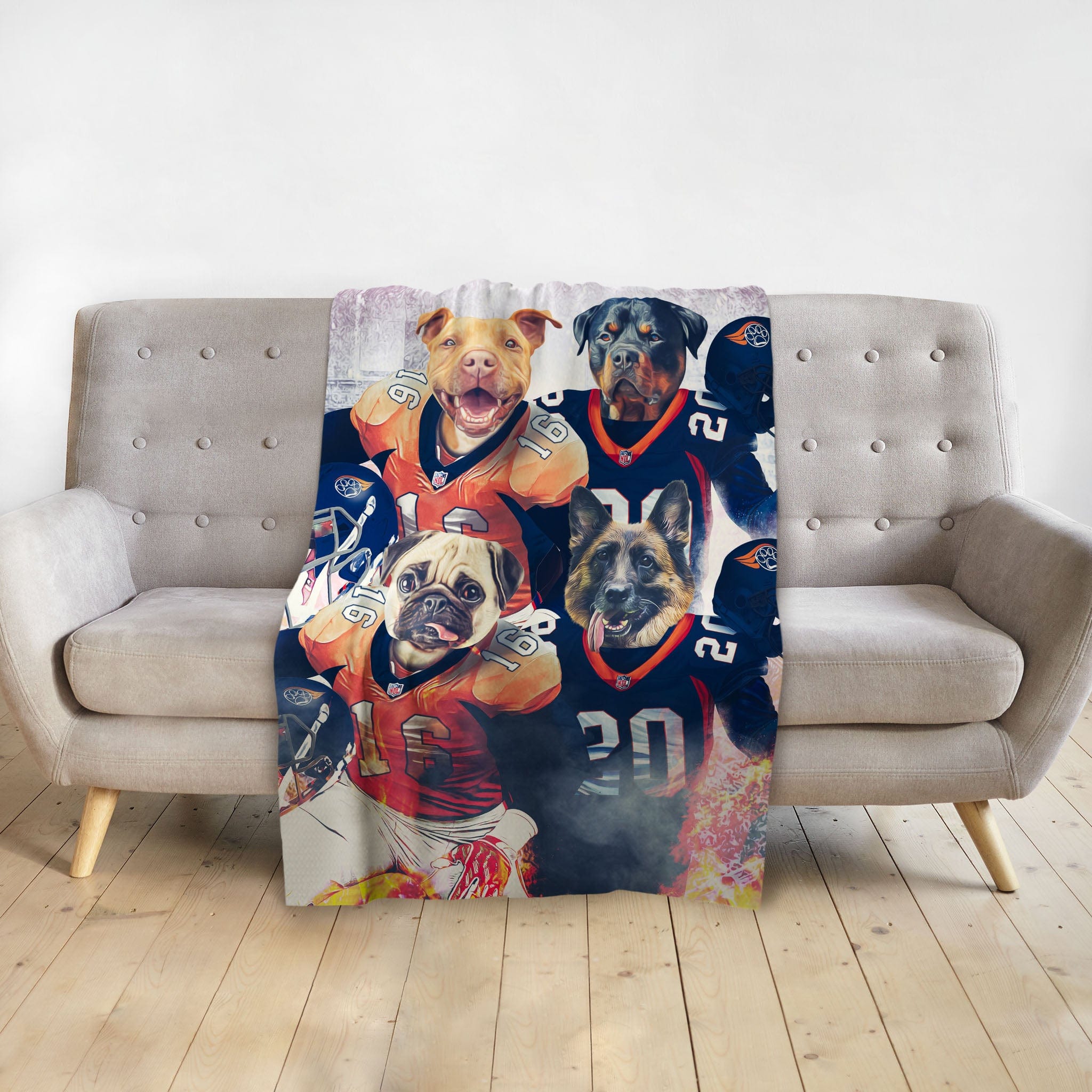Personalized custom blanket with four dogs in football jerseys on a gray sofa.