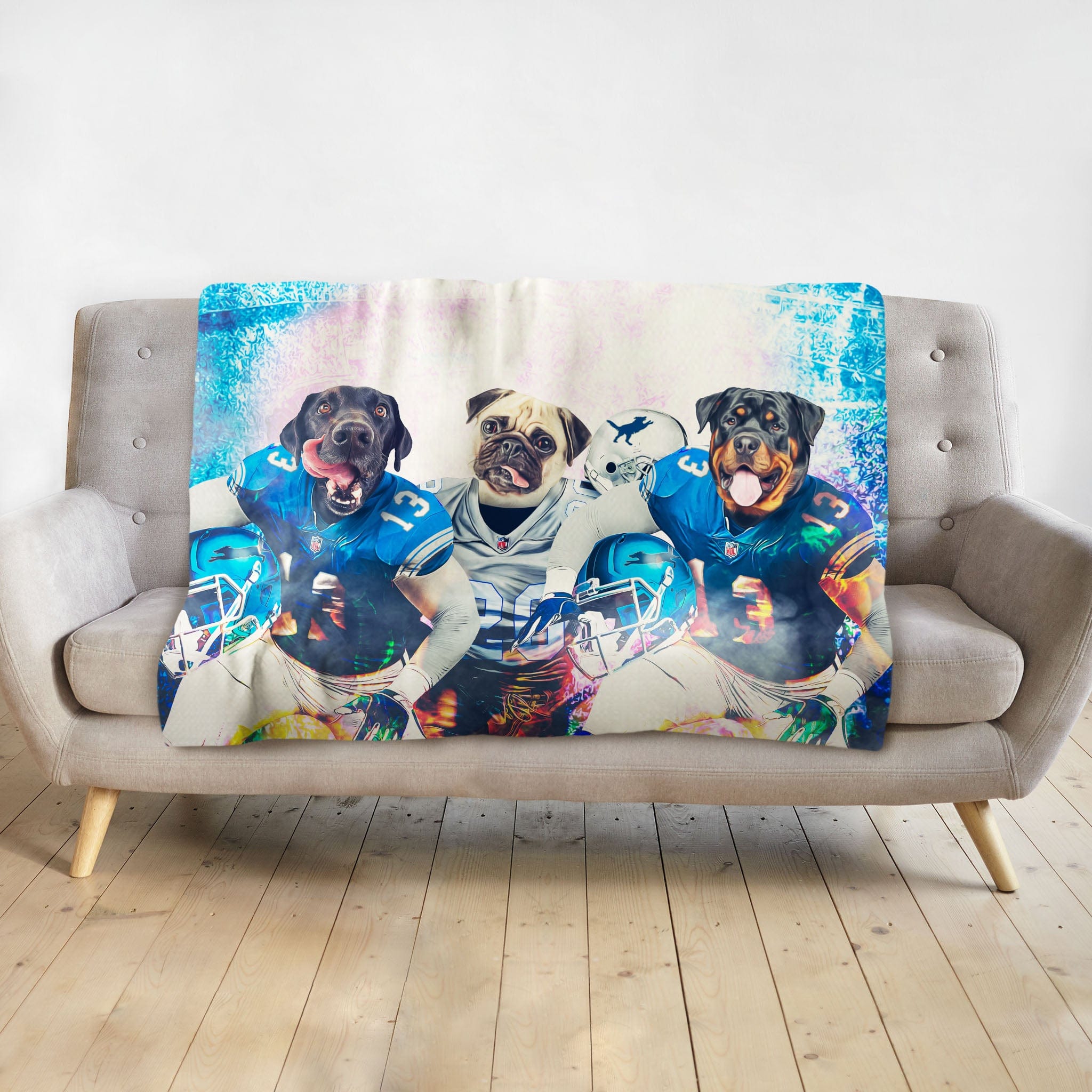 Personalized 3-pet blanket featuring dogs in blue football uniforms, Doggovinci style.