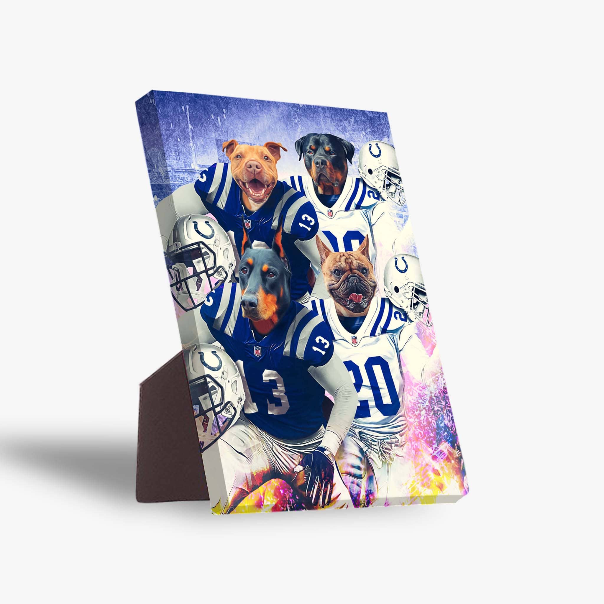Four personalized pet portraits on a standing canvas, featuring dogs in blue and white football jerseys.