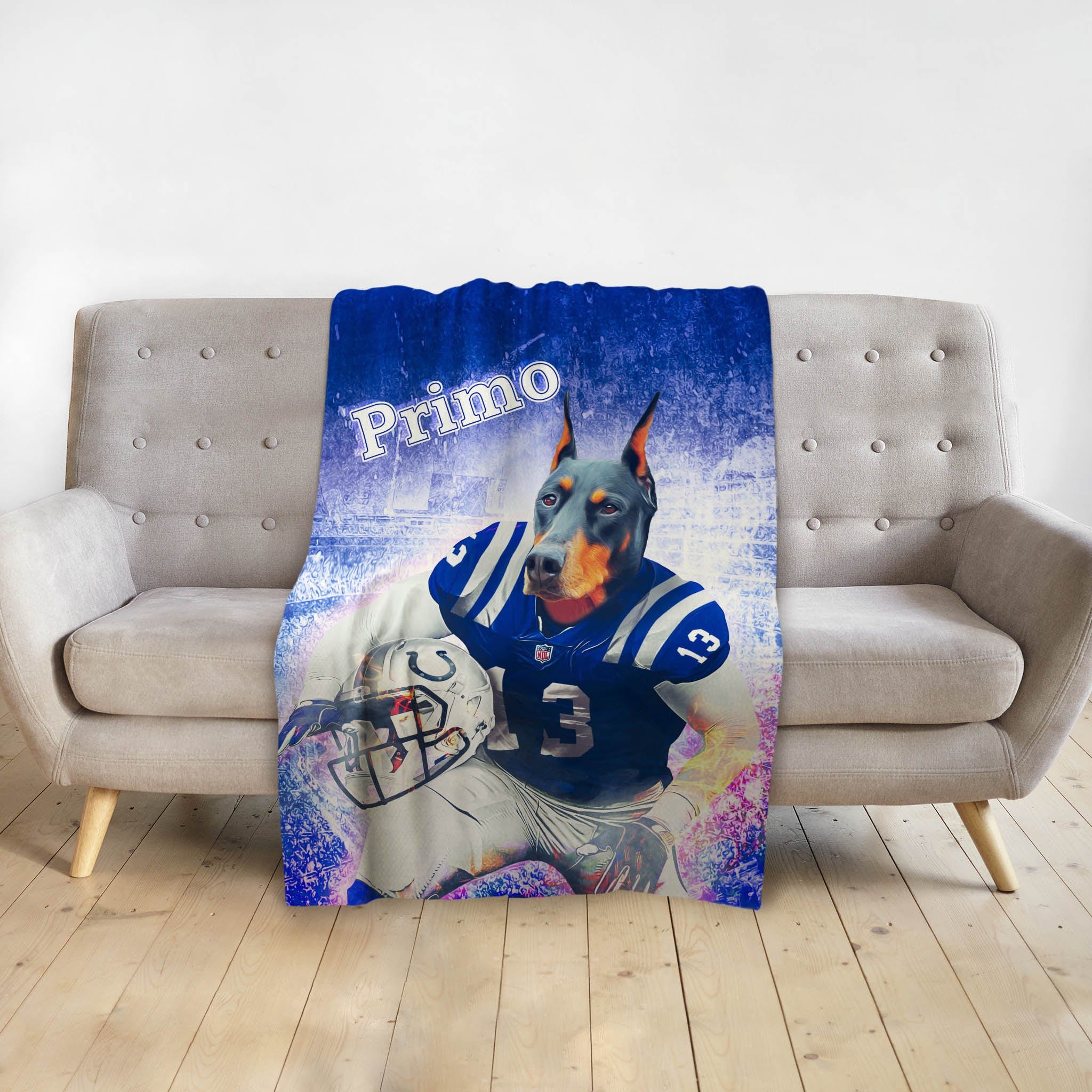 Personalized pet blanket with a Doberman dog in a blue football uniform, named "Primo".