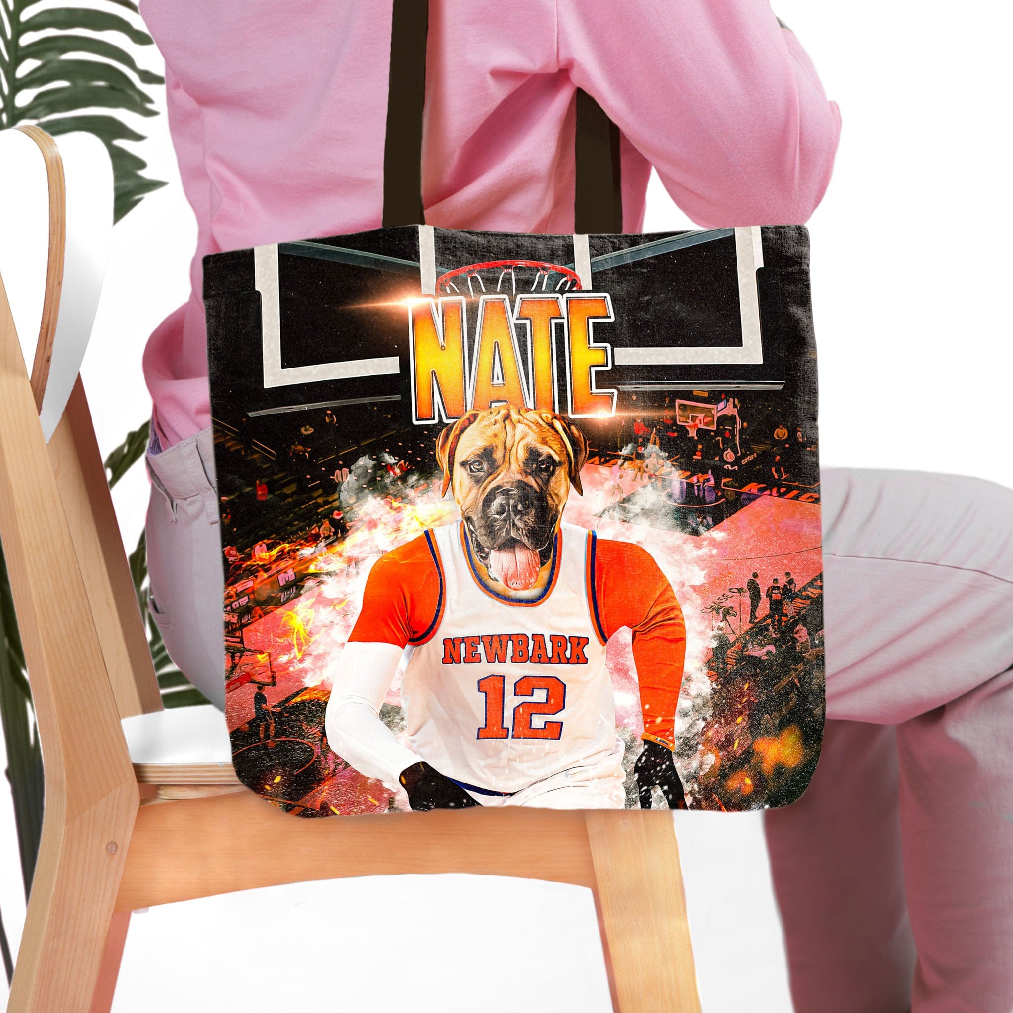 Personalized black tote bag with a custom dog portrait in a basketball jersey.