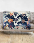 Personalized minky blanket with 6 custom dog portraits in football uniforms on a gray sofa.