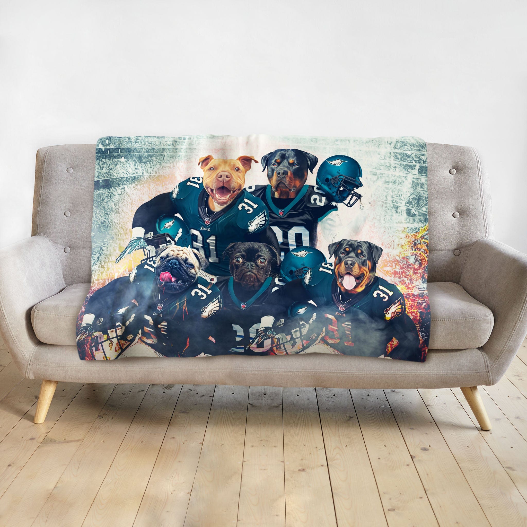 Personalized 5-pet blanket featuring dogs in Philadelphia Eagles football uniforms on a gray sofa.