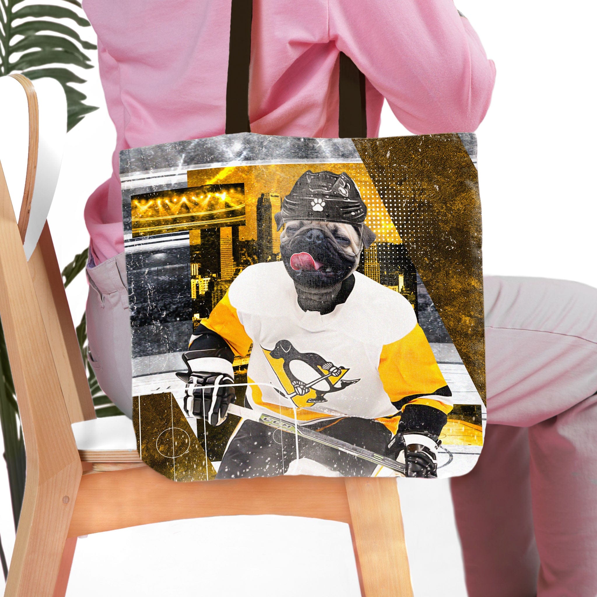 Personalized tote bag with a pug dog portrait in a Pittsburgh hockey uniform.