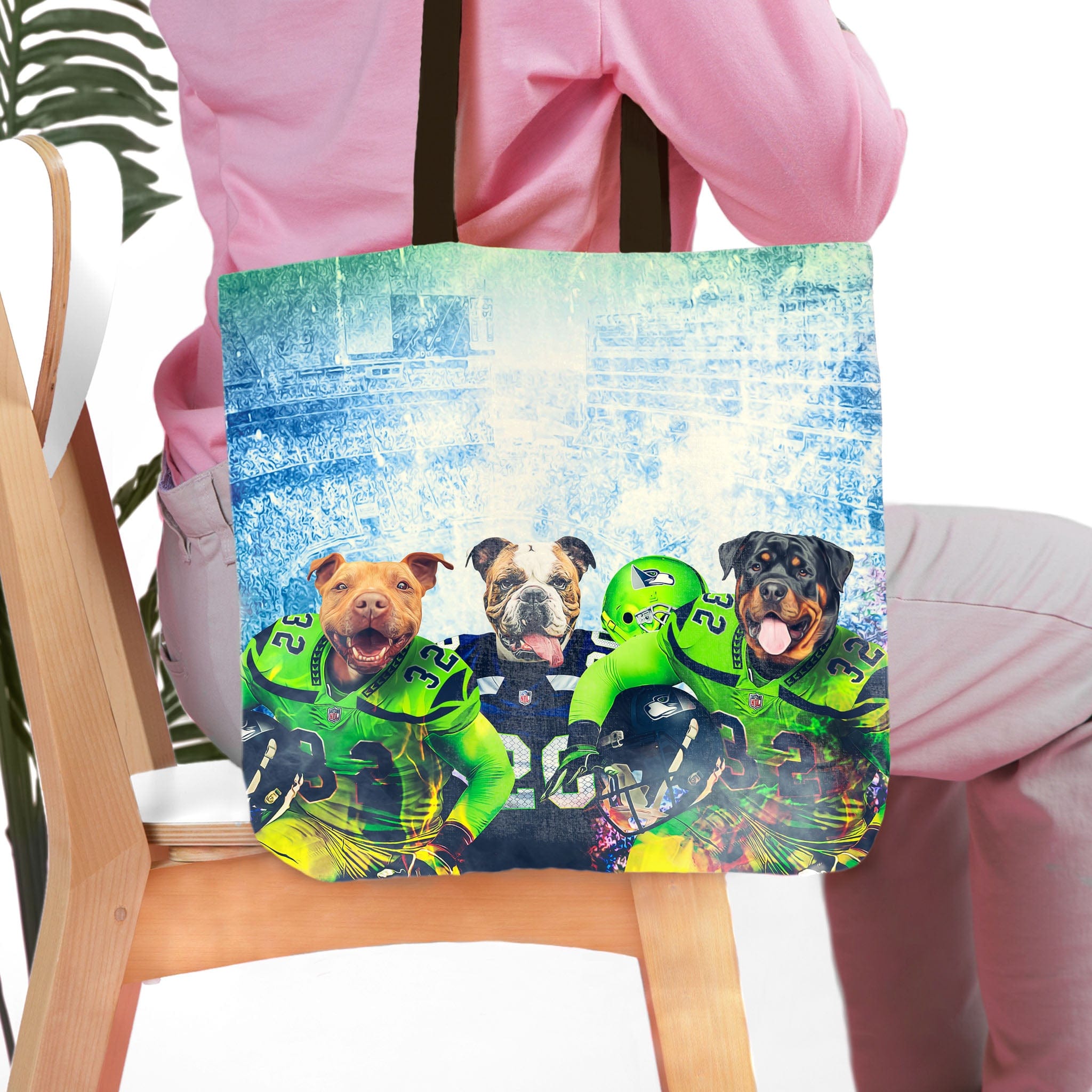 Personalized 3-pet tote bag featuring custom dog portraits in football jerseys.