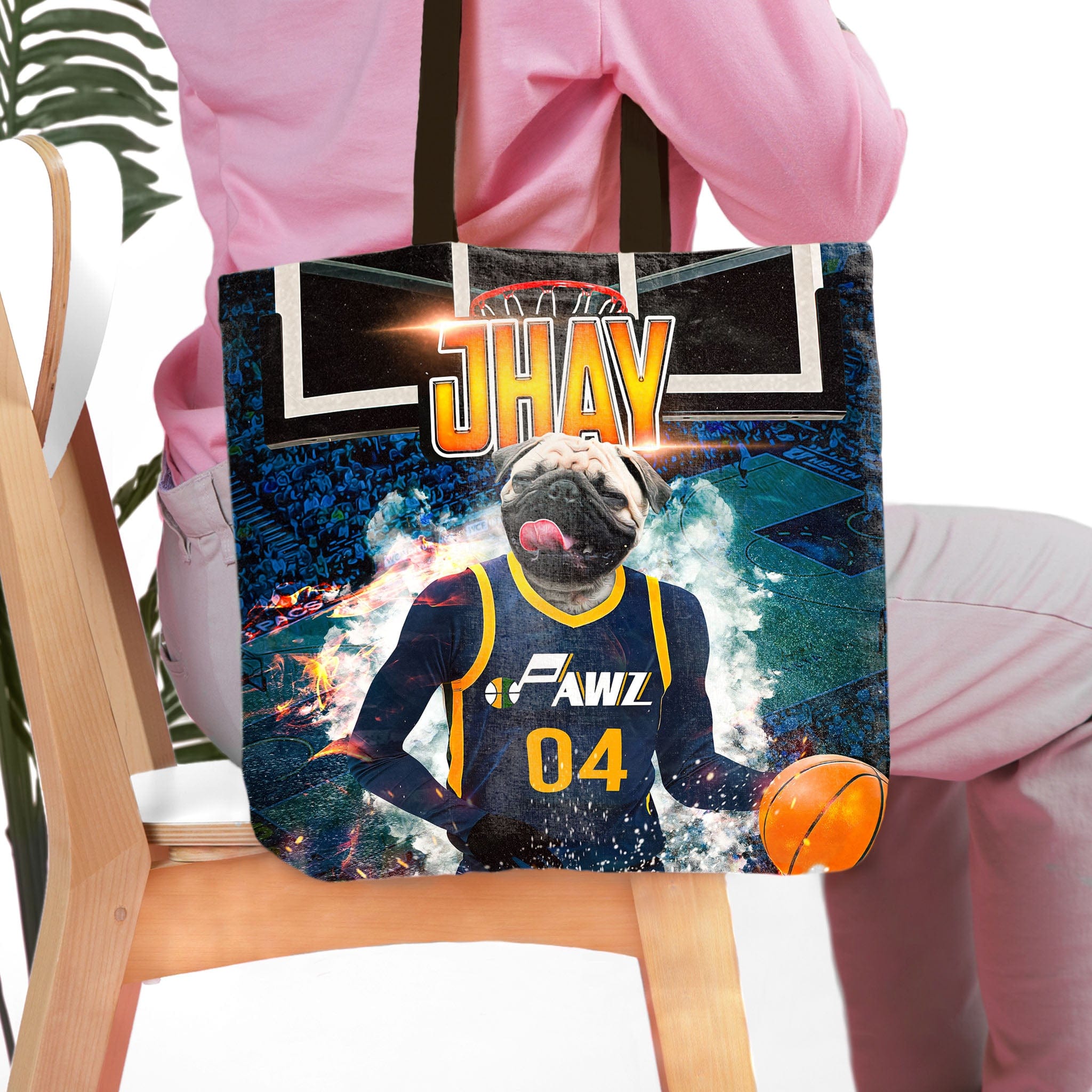 Personalized tote bag with a pug pet portrait in a basketball uniform on a court.