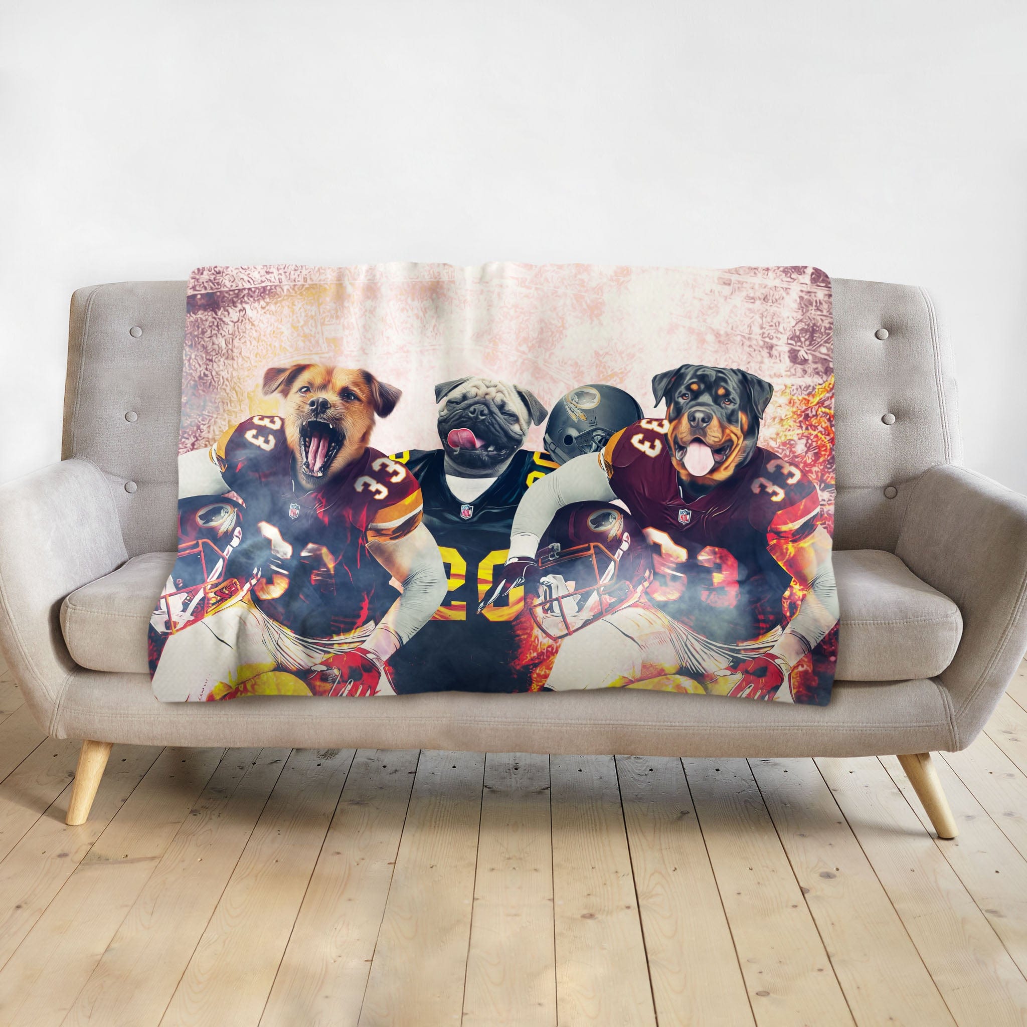 Personalized minky blanket with three dogs as football players in team jerseys.