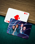 Personalized playing cards with a custom 1980s Lazer Portrait of humans and a dog on a green felt table.