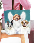 Personalized tote bag with three pet portraits as angels on a blue background.