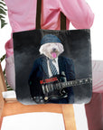 Personalized black tote bag with a custom pet portrait of a white dog dressed as a rock star playing guitar.