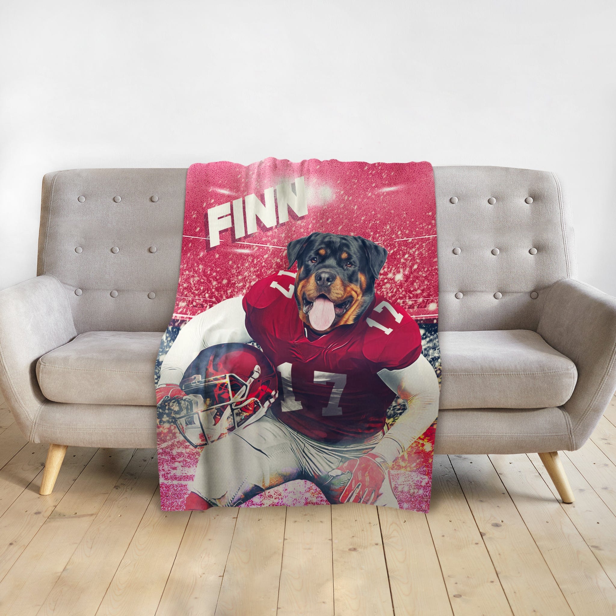 Personalized pet blanket with a Rottweiler in a red football uniform, named Finn, on a stadium background.