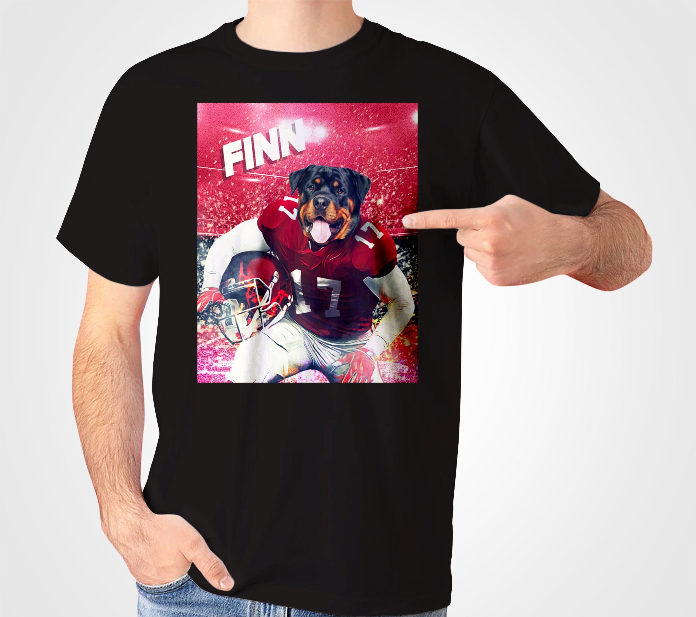 Black Gildan t-shirt with a personalized Rottweiler football player design, featuring "FINN" and a red stadium background.
